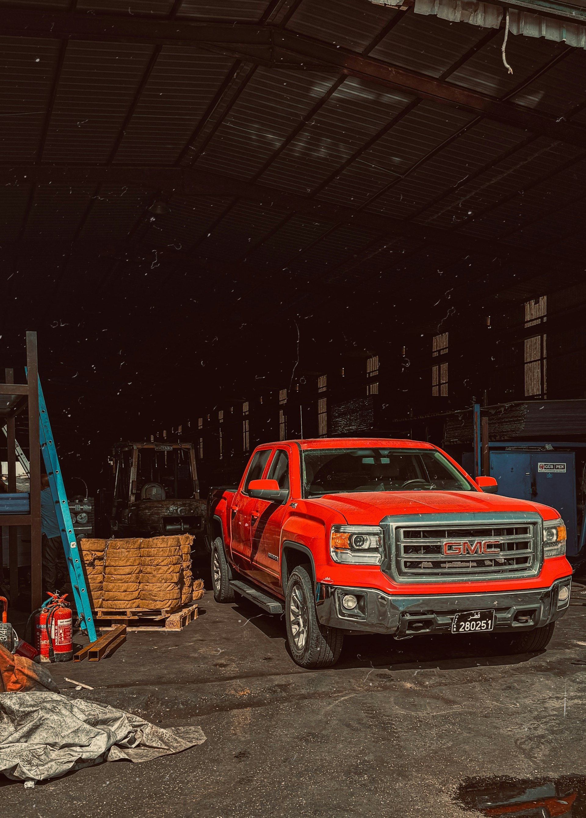Red truck in garage — Foley Transmission service bay